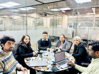 upGrad Indore Office - student and parents with the counselling team after their study abroad session